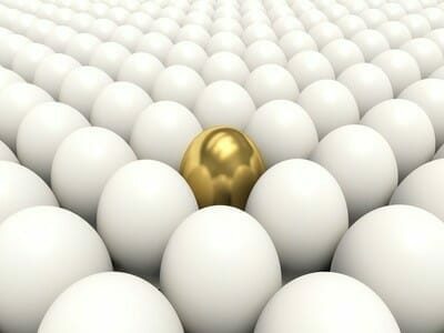 Golden egg among white eggs. 3d render illustration.